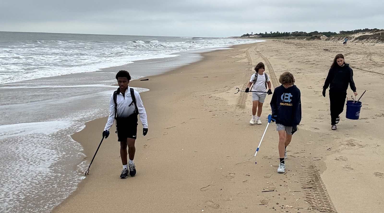 Beacon Middle School students cleaning up the beach