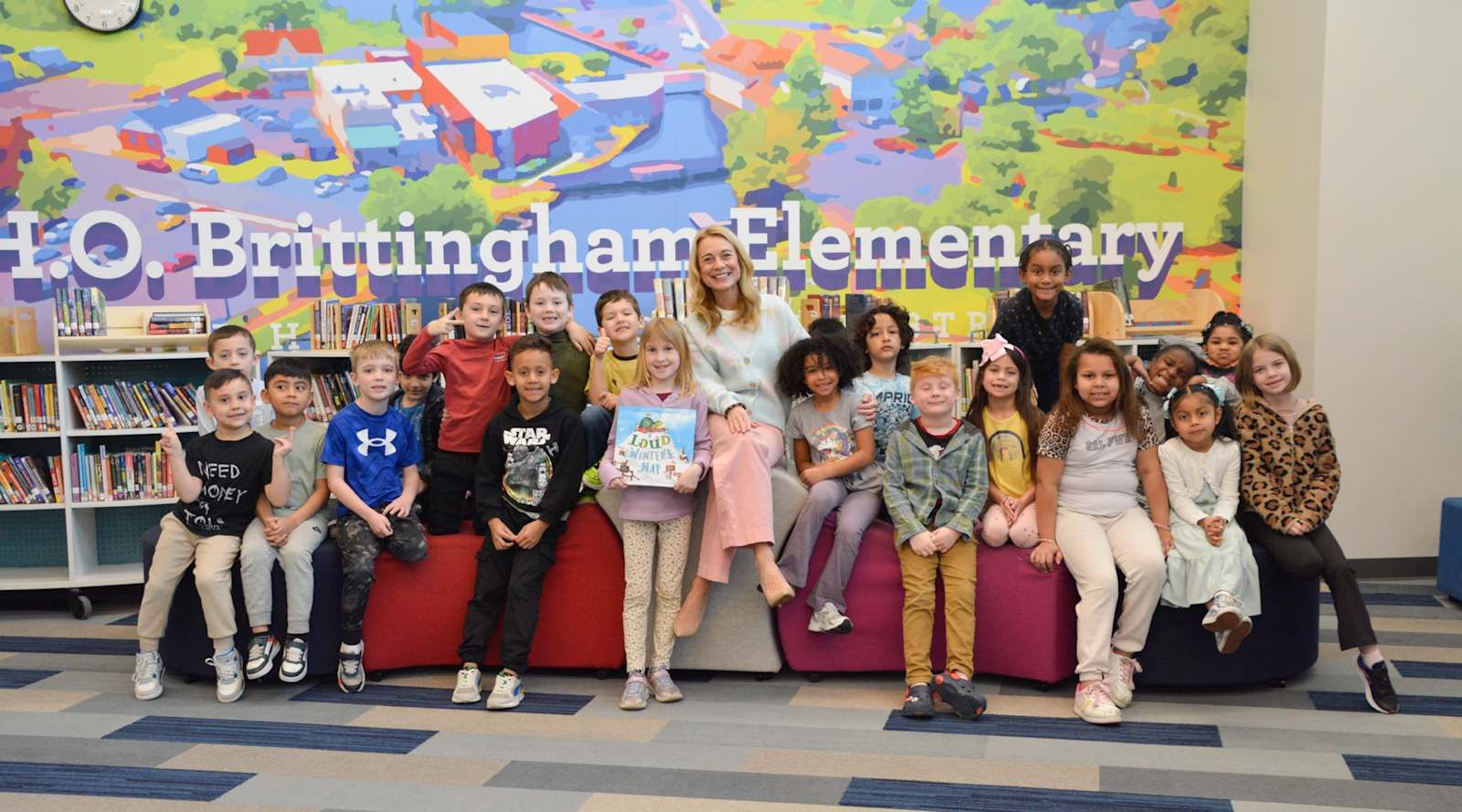 Superintendent Dr. Jenny Nauman with H.O. Brittingham Elementary students in the library